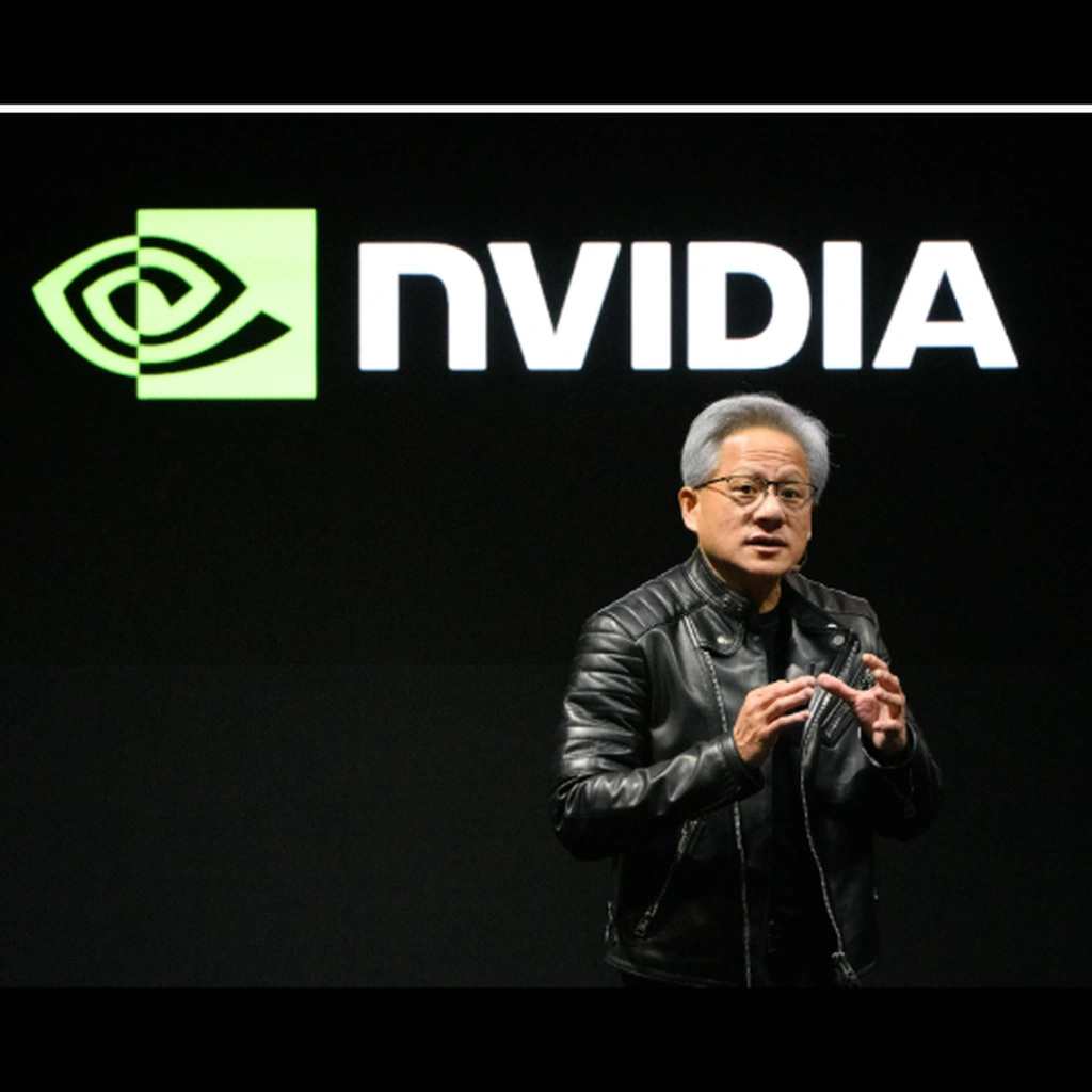 Jensen Huang presenting on stage with Nvidia AI investments
